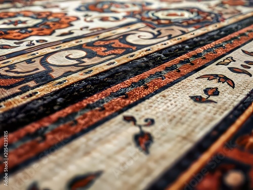 Close-up of traditional oriental rug pattern.