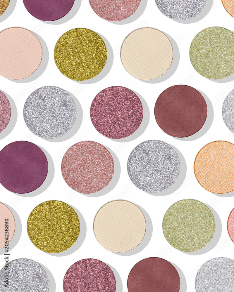 Fototapeta premium Shiny bright eyeshadow swatches with matte and shimmering texture with shadows as minimal trend beauty pattern on white. Modern facial cosmetic flat lay colorful makeup textures, top view background.