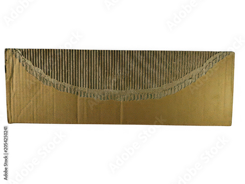 Фотография Intricate golden metal comb with evenly spaced teeth for hair grooming