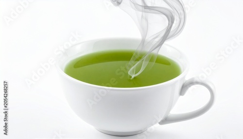 White ceramic cup of steaming green tea, vivid bright liquid against plain background, fresh and calming atmosphere with vibrant color contrast…