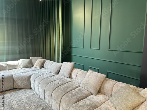 Obraz na płótnie Comfortable sofa near green wall indoors. Interior design