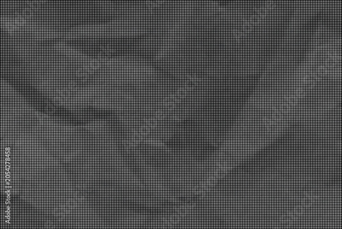 A close-up view of a crumpled gray fabric texture indoors