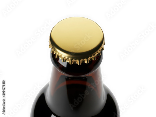 Close up top view of a brown glass beer bottle with a gold metal cap