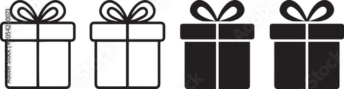 Four wrapped Christmas gifts with ribbons and bows on white background minimalist holiday packaging