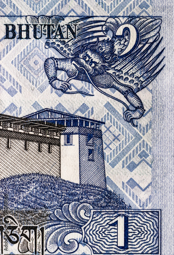 Photos 1 ngultrum banknote of Bhutan with the image of Simtokha Dzong Palace, fragment for designers