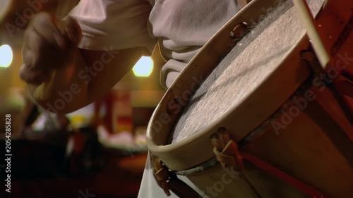Close Up of Musician Playing Bombo Leguero Drum at Night - 4K