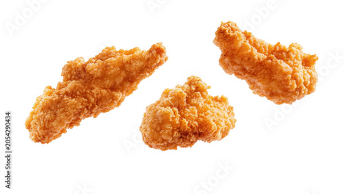 Three crispy fried chicken tenders isolated on transparent background ready for menu.