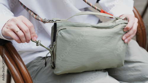 woman holding a stylish streetwear bag