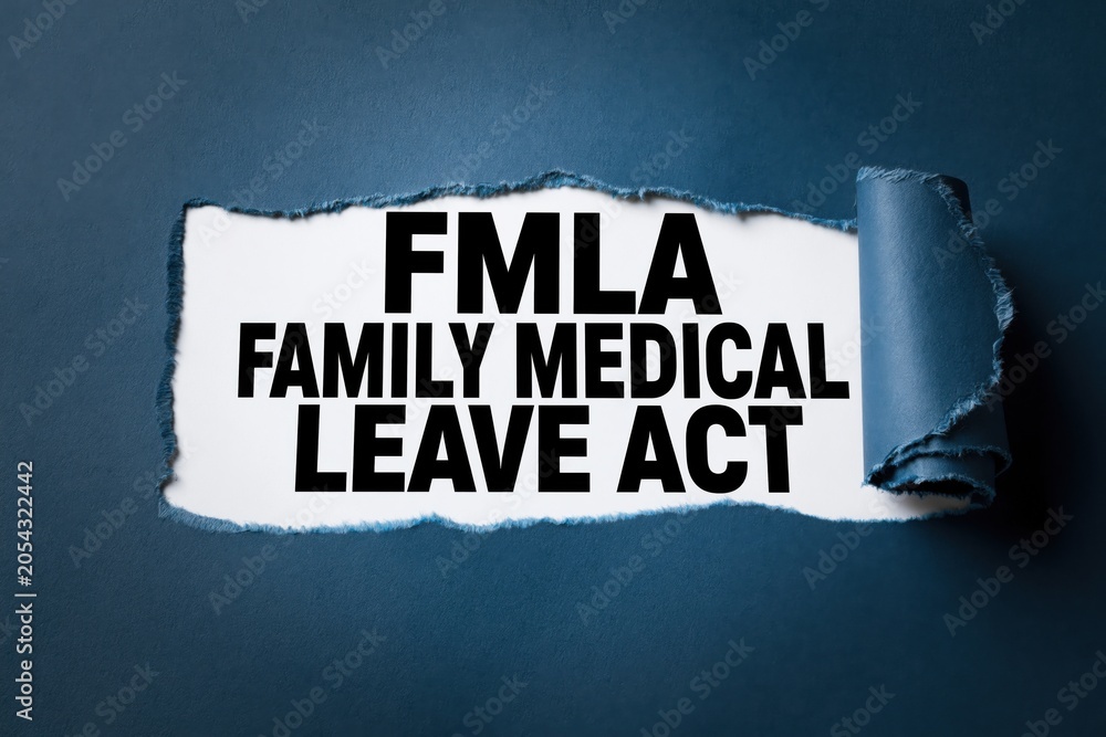 Naklejka premium fmla family medical leave act written under a torn blue paper