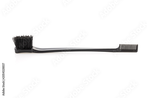 Brush with hair dyeing product isolated on white, top view