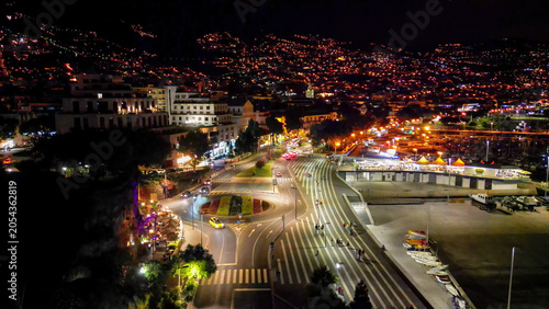 Fotografie Panoramic drone perspective of Funchal showing the main oceanfront highway, city