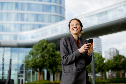 Woman in business attire sm...