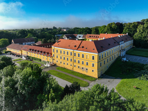 Aerial view of Belcredi Castle complex on a sunny morning, Brno, Czech Republic.