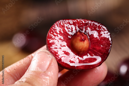 Billede på lærred Fresh Yantai Cherry Half with Pit - Premium Shandong Fruit Comparable to Chilean