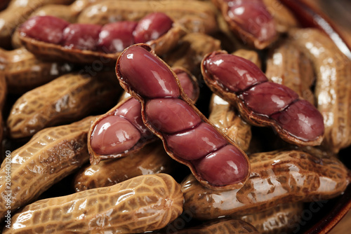 Принти на полотні Boiled Peanuts Traditional Salted Snack Food with Red Kernels in Shells