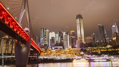 Chongqing cyberpunk city skyline with river and hongyadong night time