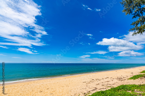 Beautiful beach and sea with clear blue sky background