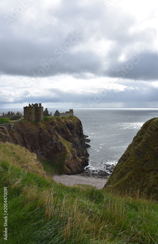 Cloudy Skies Above Historic Coastal Castle Ruins