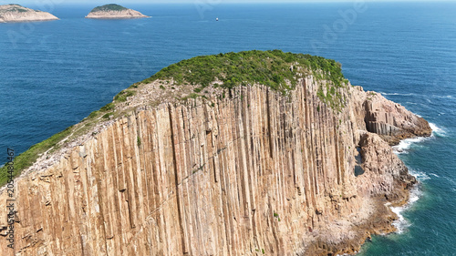Foto Columnar Basalt Cliffs and Oceanic Landscape