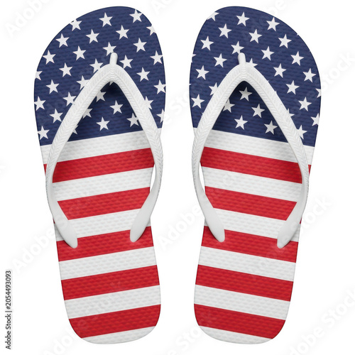 Pair of american flag flip flops on feet with toes pointing up