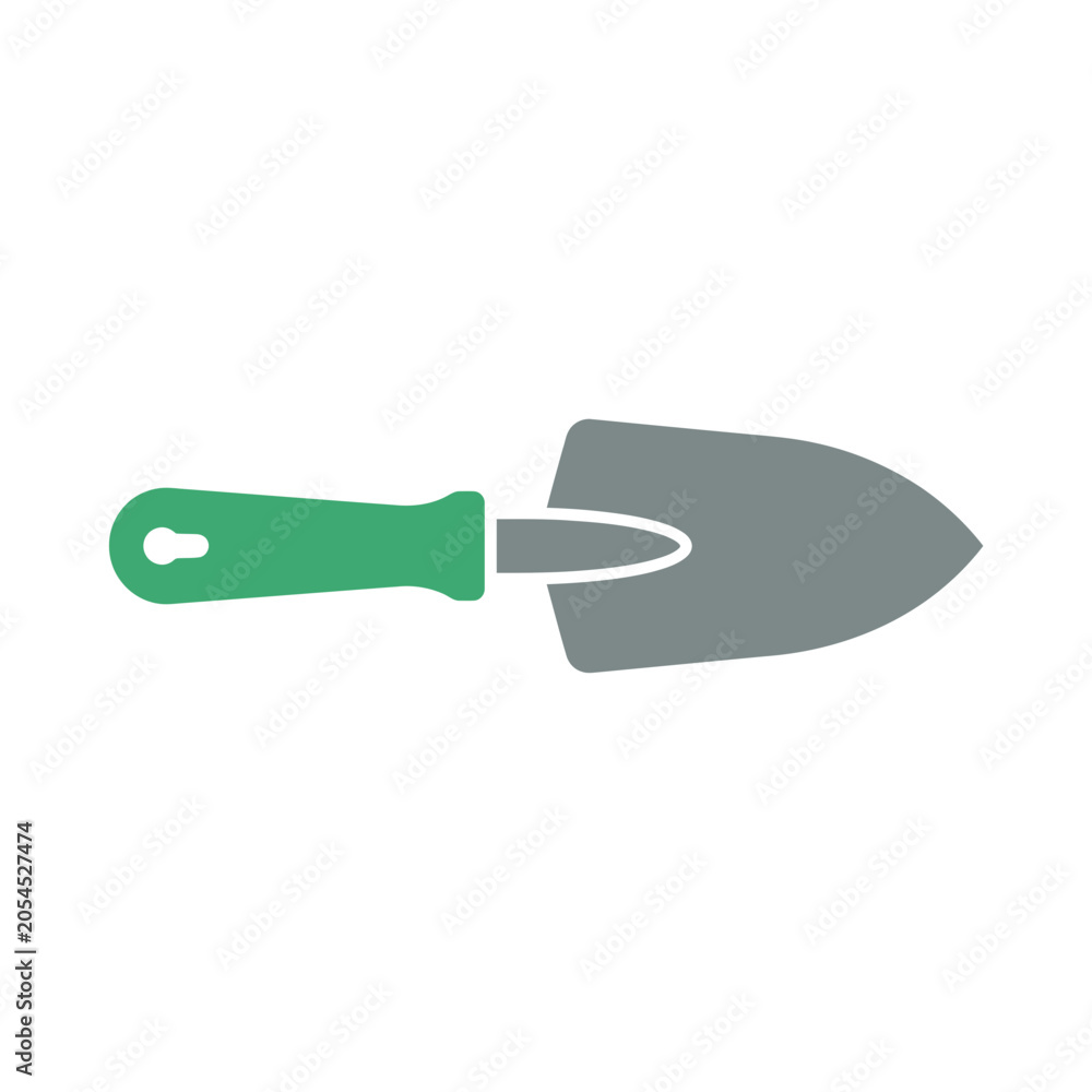 Fototapeta premium A green hand trowel used for gardening