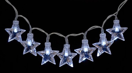 Glowing star fairy lights string on black background