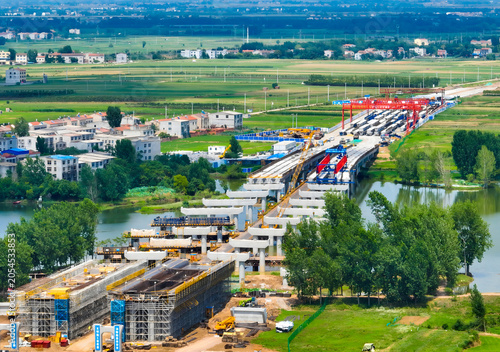 Tableau sur toile Xiangjiang Bridge Construction Aerial View with Heavy Equipment