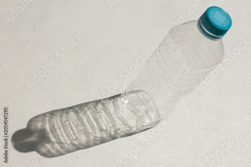 It is an empty plastic bottle.