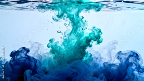 Blue and teal ink swirling in water