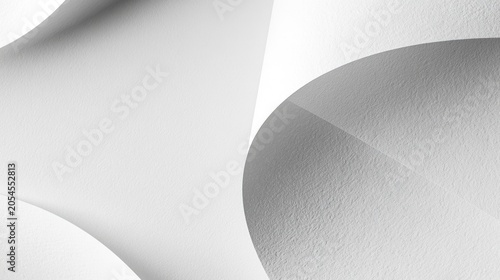 Close-up of delicate, flowing white fabric with soft lighting and smooth textures creating an abstract, graceful composition.
