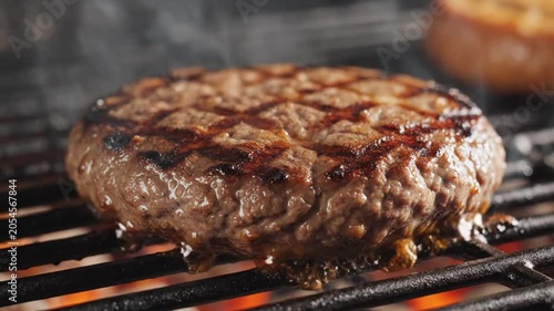 Juicy Beef Burger Patty Sizzling On Hot Grill With Smoke Close-Up BBQ Food Photography