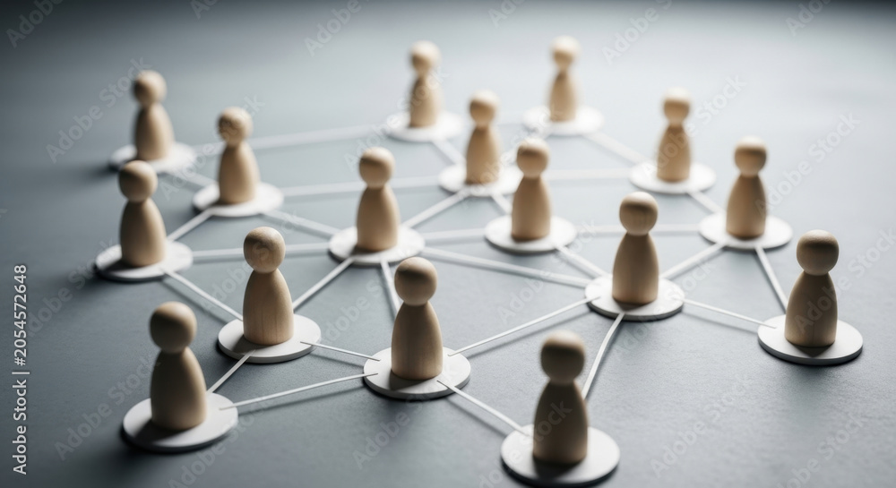 Obraz premium Wooden Figures Connected Network Communication Teamwork Collaboration Connection Structure Social Web Togetherness Unity Relationship Linkage