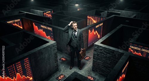Confused businessman lost in a dark complex maze with downward stock market trends, financial crisis concept.