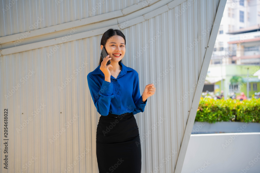 Fototapeta premium Asian businesswoman was happy because she had been promoted