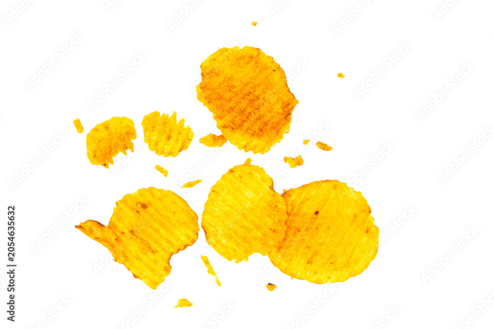 Naklejka premium potato chips and crumbs float dynamically against a clean white background.