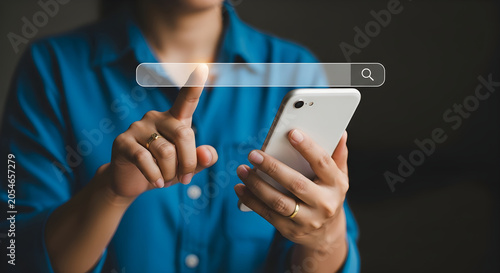 Woman interacting with search bar on smartphone screen with finger