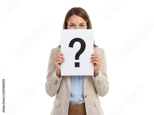 Question mark sign held by business woman, professional female employee hiding face behind paper with interrogation symbol, mystery and curiosity concept