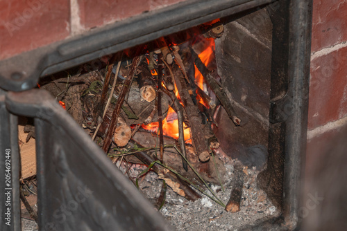 A fire in the furnace of a brick heating furnace in close-up