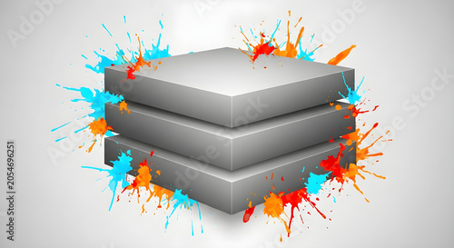 Vibrant colorful paint splashes surround stacked gray blocks