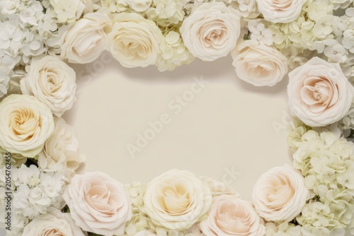 A beautiful frame border created with delicate white roses and soft hydrangeas offering elegant space for text or design