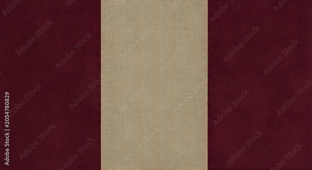 Fototapeta premium A close-up view of a red and beige striped fabric texture