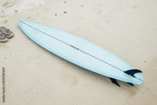 Light Blue Surfboard on Sandy Beach