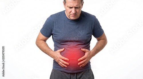 Man Holding Stomach in Pain Standing Against White Background Medical Concept