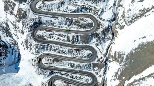Bild auf Leinwand Los Caracoles highway road near Santiago Chile in aerial view
