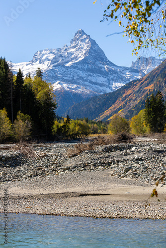 View of river and Mount Belalakaya in North Caucasus mountains at autumn