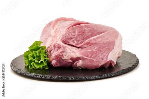 Fresh Raw Pork Shoulder with Lettuce on a Slate Board