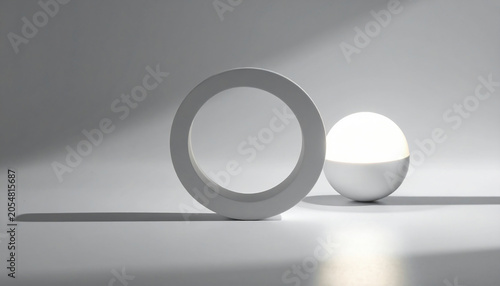 Abstract minimalist composition featuring geometric circular forms illuminated by soft natural light, creating a serene balance of shape, shadow, space, and modern design.