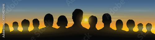 Diverse eople faces portraits front view black silhouettes with sunset sky as background vector illustration.