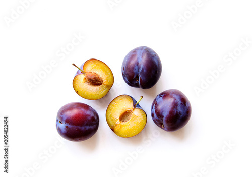Plums isolated on white background.
