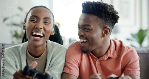 Принти на полотні Relax, laugh and black couple with video game in home for fun challenge, esport date or bonding